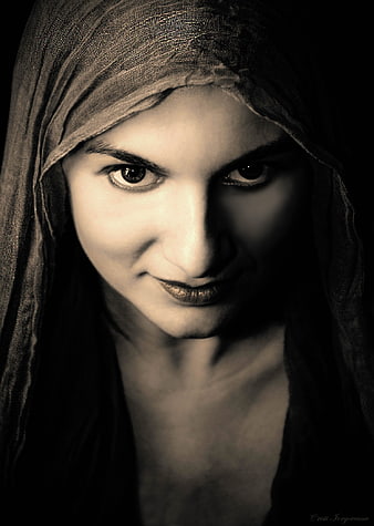 Dramatic Sepia Portrait of Woman Wearing Headscarf
