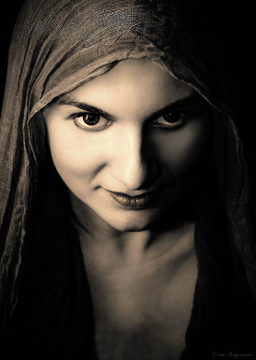 Dramatic Sepia Portrait of Woman Wearing Headscarf
