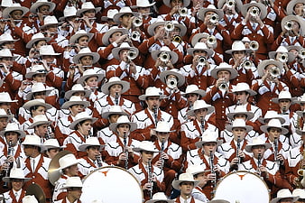 Texas Longhorn Marching Band Playing Instruments in Uniform
