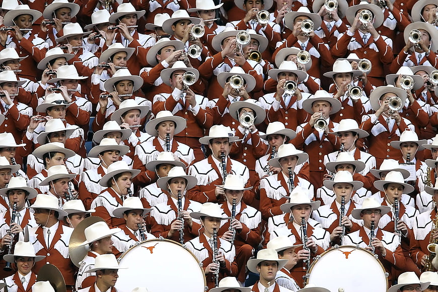 Texas Longhorn Marching Band Playing Instruments in Uniform