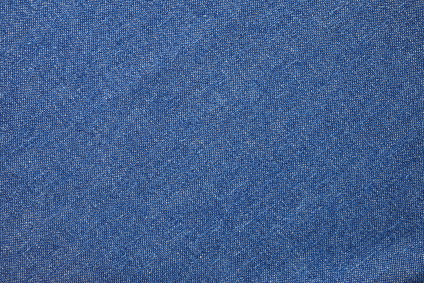 Blue Denim Fabric Texture Closeup Background