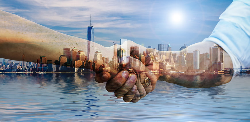 Double Exposure Handshake With City Skyline And Water Reflection