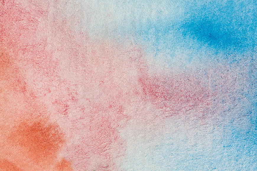 Abstract watercolor texture background with pink and blue hues