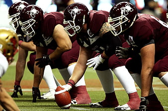American Football Offensive Line at Line of Scrimmage