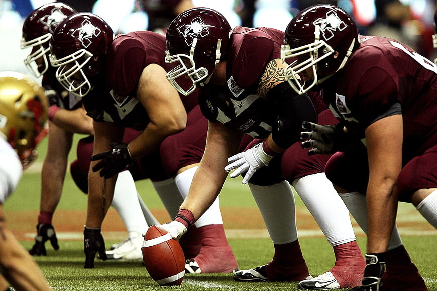 American Football Offensive Line at Line of Scrimmage