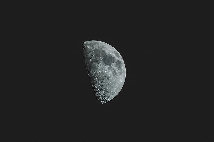 Detailed Crescent Moon in Dark Night Sky