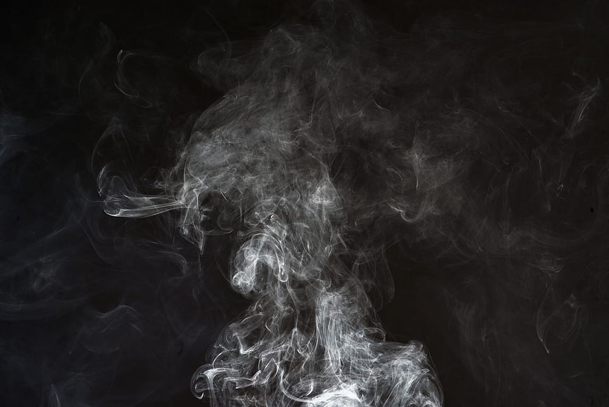 White Smoke Swirls on Black Background Abstract Texture