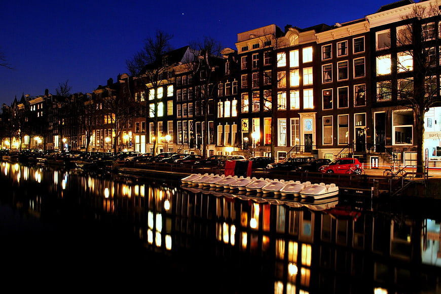 Amsterdam Canal Houses at Night with Reflections