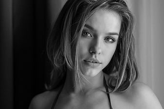 Black and white portrait of a young woman with a direct gaze