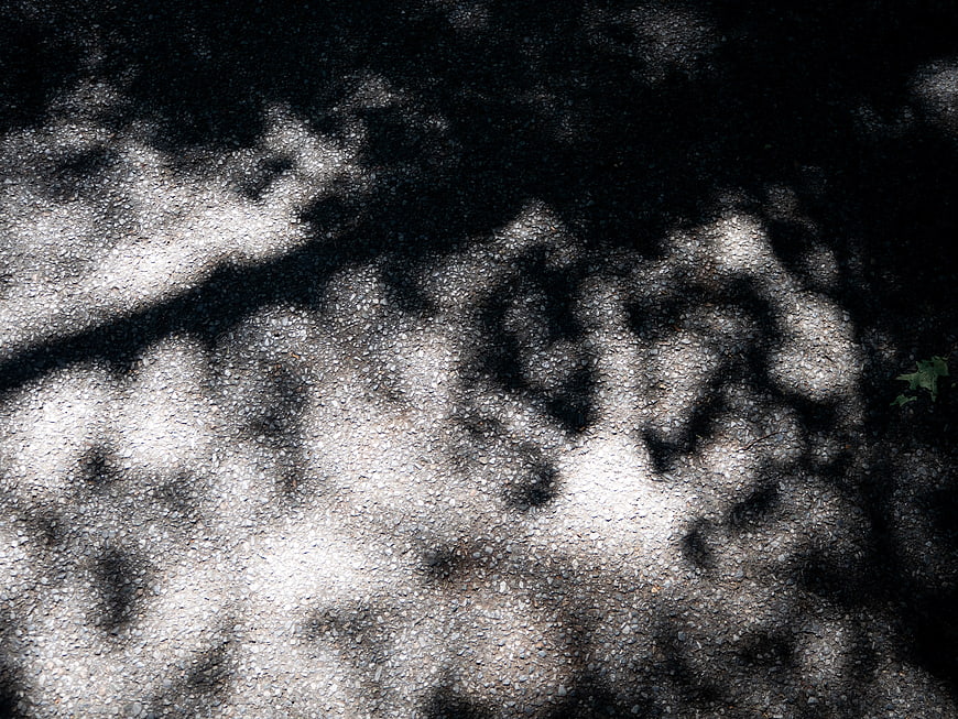 Abstract Shadows on Textured Concrete Pavement