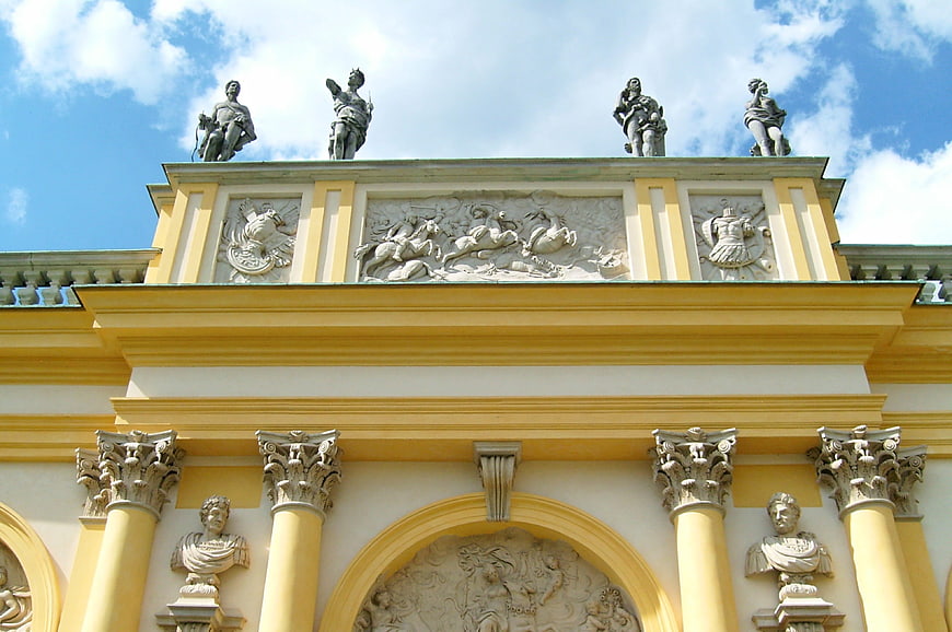 Yellow Baroque Palace Facade with Sculptures and Columns