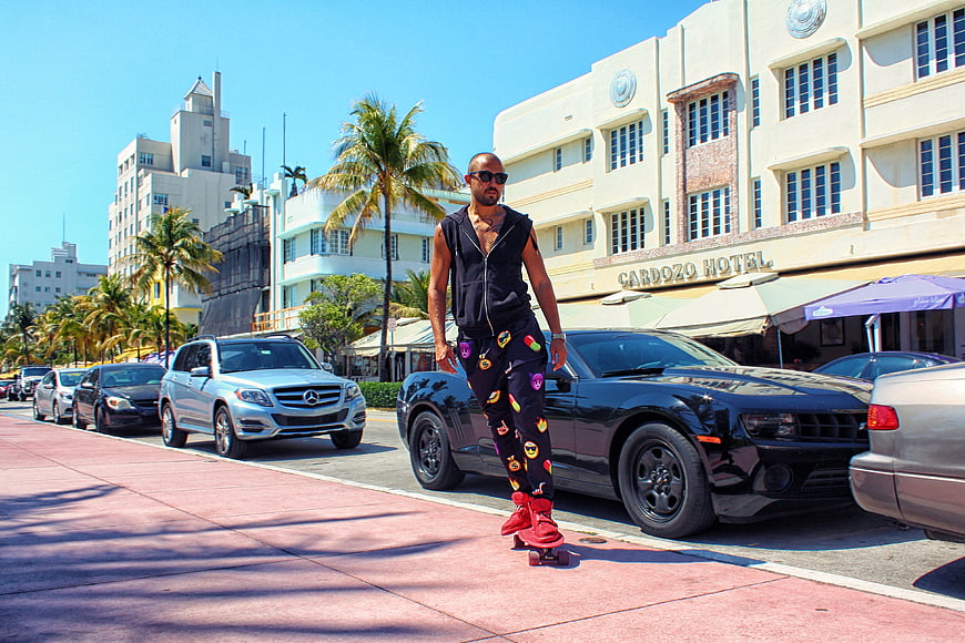 Man Skateboarding on Miami Beach Ocean Drive
