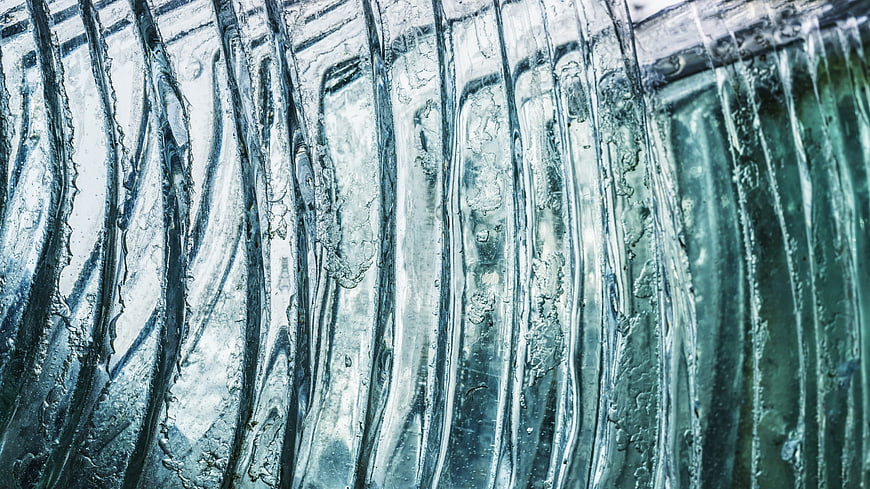 Abstract Close-Up of Textured Blue Glass Surface