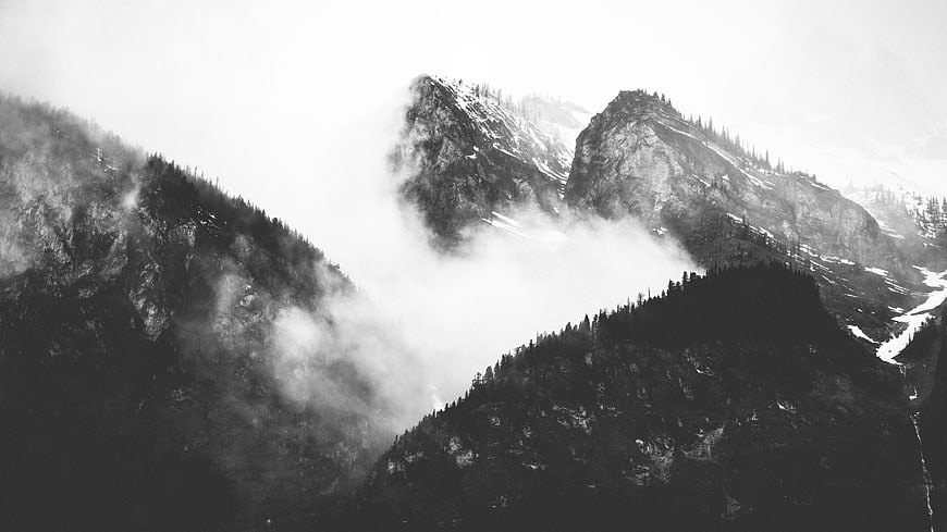 Dramatic Black and White Mountain Peaks in Fog