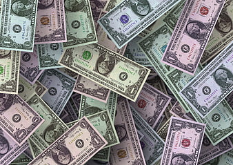 Scattered pile of one dollar bills background