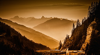 Golden Hour Mountain Landscape with Misty Forest Valley