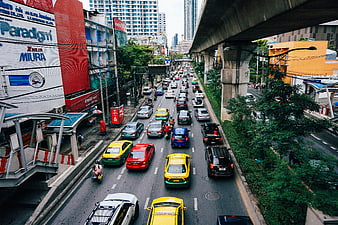 Busy Urban Traffic with Taxis and Elevated Highway