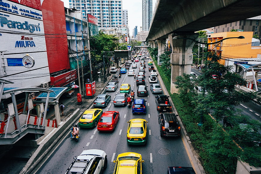Busy Urban Traffic with Taxis and Elevated Highway