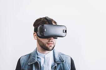 Man Wearing VR Headset on White Background