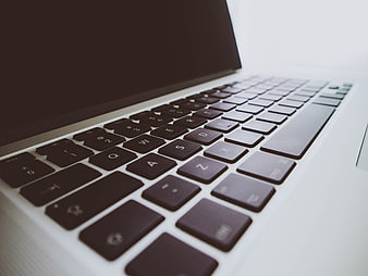 Close-up of laptop keyboard with shallow depth of field