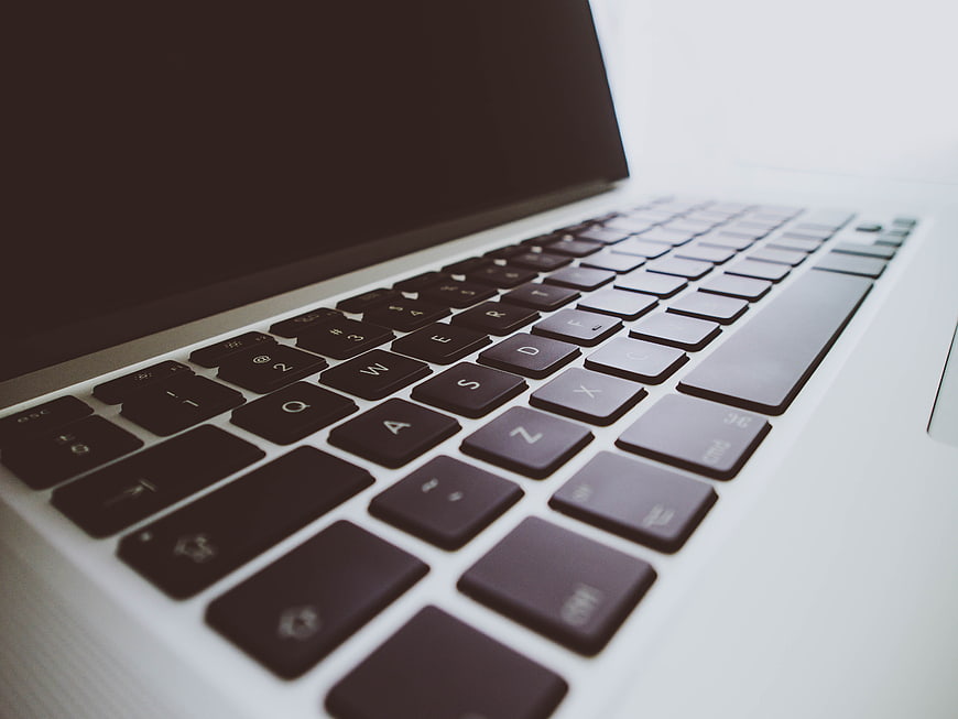 Close-up of laptop keyboard with shallow depth of field