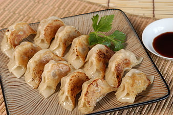 Pan-Fried Gyoza Dumplings With Soy Sauce Dipping Sauce