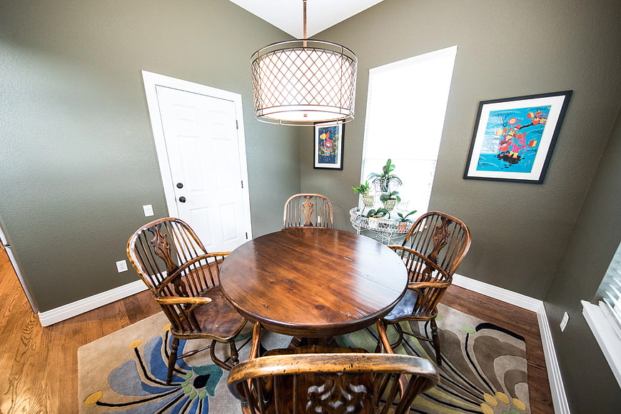 Cozy Dining Room with Wooden Table and Chairs