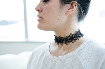 Profile Portrait of Woman Wearing Black Lace Choker Necklace