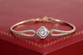 Luxury Gold Diamond Tennis Bracelet on Red Box