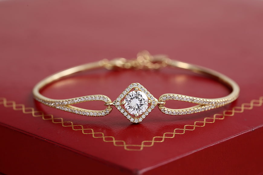 Luxury Gold Diamond Tennis Bracelet on Red Box
