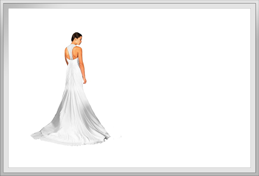 Elegant bride in white wedding dress with long train on white background