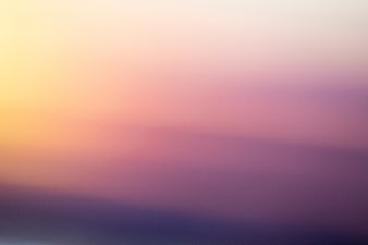 Abstract Soft Gradient Background with Pink, Purple, and Yellow Hues