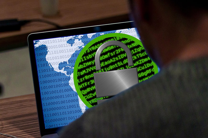 Cybersecurity Concept with Padlock Overlay on Laptop Screen