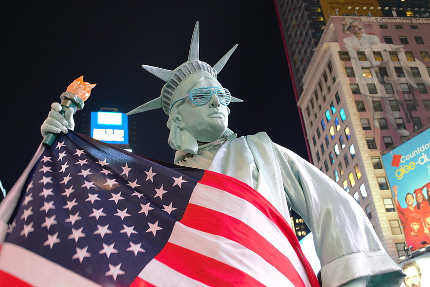 Statue of Liberty Costume with Sunglasses and American Flag