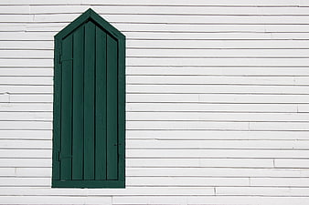 Green Wooden Door on White Siding Wall