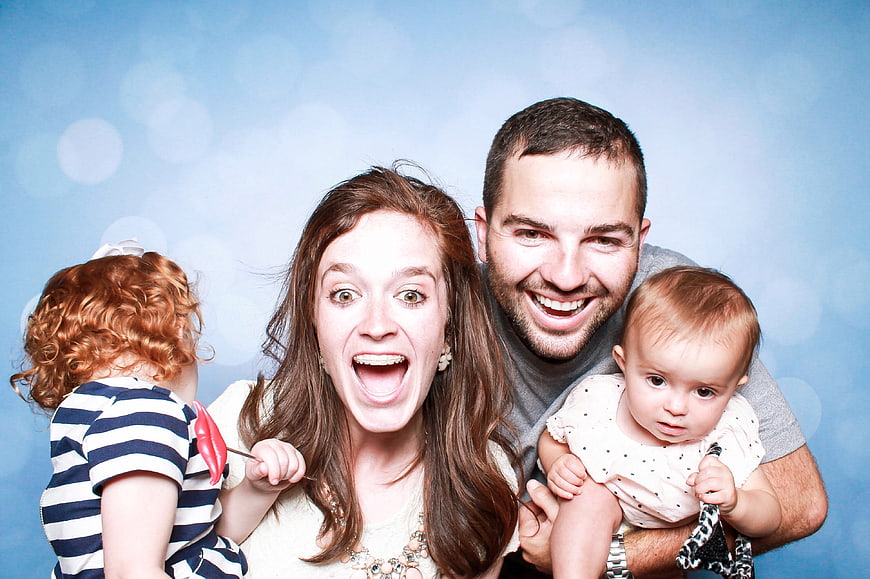 Happy family portrait with mother, father, and two children