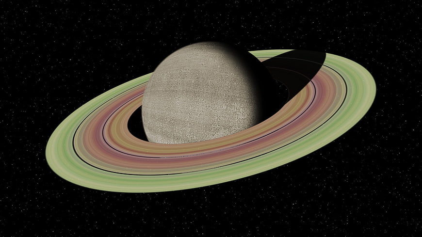 Saturn Planet With Rings Against Black Starry Space Background