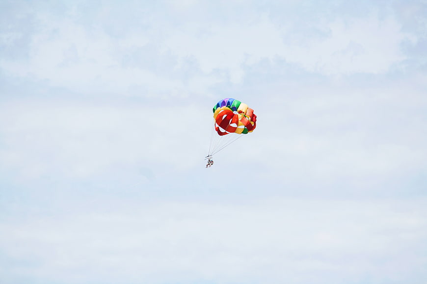 Colorful Parasailing Canopy Against Blue Sky