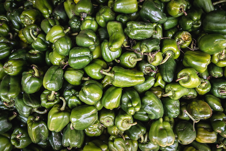 Top View of Fresh Green Bell Peppers Pile