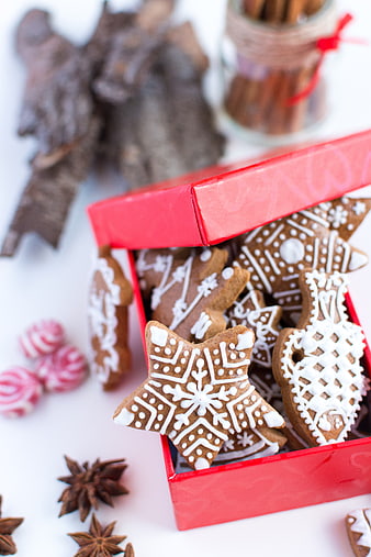 Traditional Christmas gingerbread cookies in a red gift box