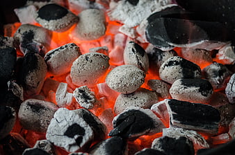 Glowing charcoal embers for BBQ and grilling