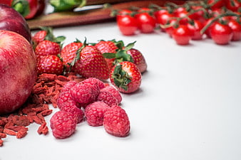 Fresh Raspberries, Strawberries, and Apples on White Background