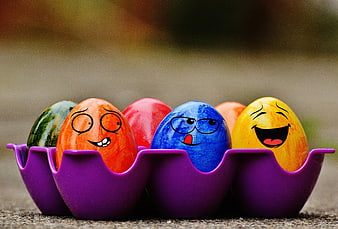 Colorful Easter Eggs with Funny Faces in Purple Holder