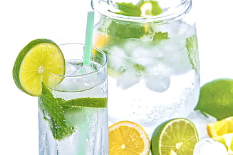 Refreshing Mojito with Lime and Mint on White Background