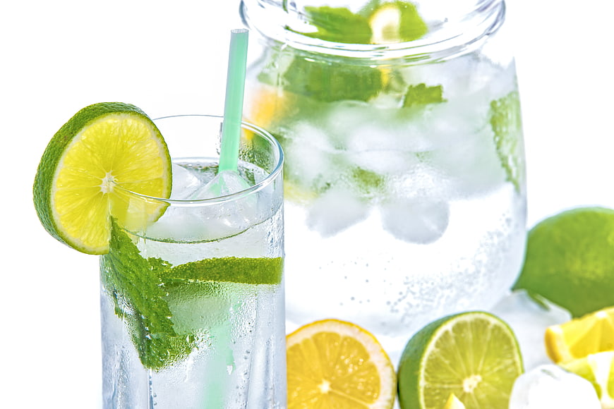 Refreshing Mojito with Lime and Mint on White Background