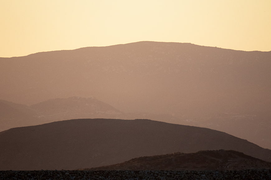 Minimalist Hazy Mountain Silhouette at Sunset
