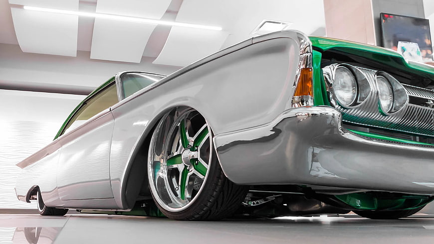 Low Angle Shot of Custom Silver and Green Lowrider Car