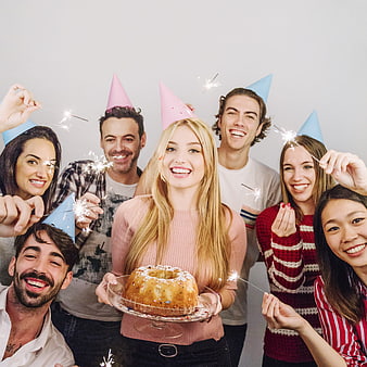 Happy Birthday Party Group with Cake and Sparklers