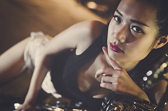 Cinematic Portrait of Asian Woman with Red Lipstick