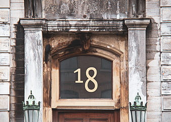 Vintage Stone Building Entrance with Number 18
